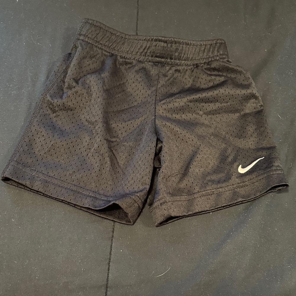 Nike Black Mesh Shorts with White Swoosh